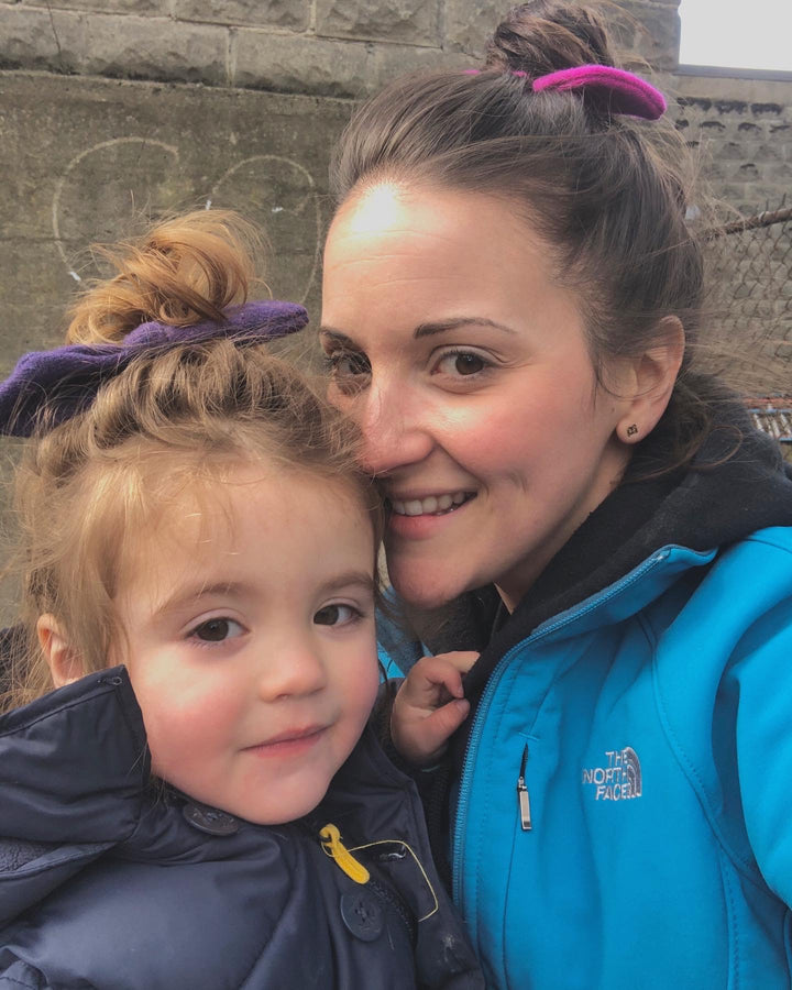 Mom and Daughter wearing a Purple and Magenta Hair Bow Tie made from recycled cashmere sweaters